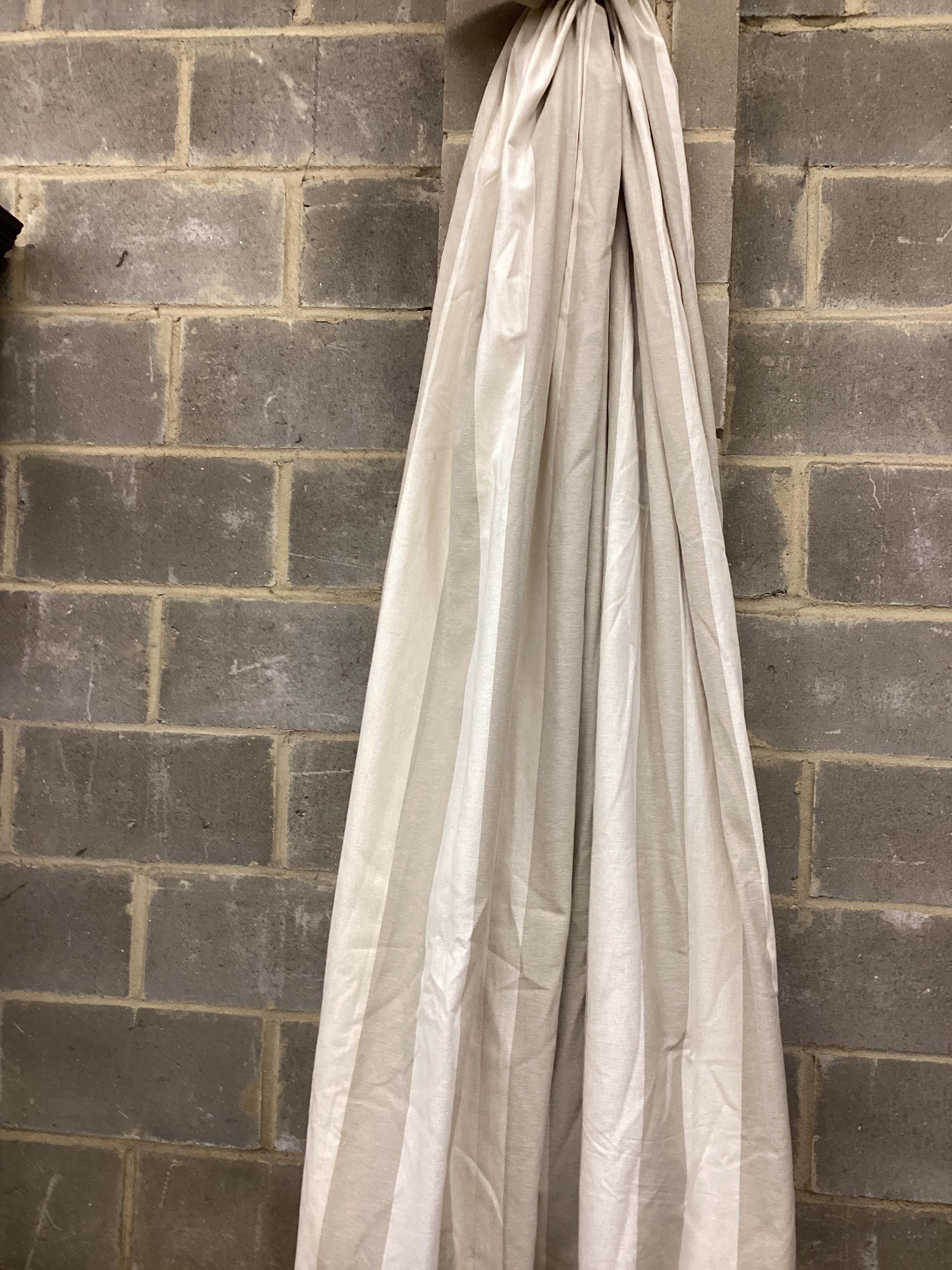 Three pairs of French grey and natural linen curtains, one pair 120cm / 440cm width, drop 224cm, two pairs 120cm / 320cm width, drop 210cm. (All measurements approximate).